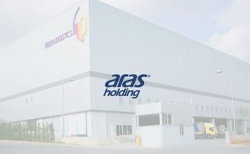 Türkiye’nin önemli lojistik ve taşımacılık gruplarından biri olan Aras Holding, lojistik, taşımacılık, akaryakıt, bilişim ve araç kiralama alanlarındaki yatırımlarıyla dikkat çekmeye devam ediyor. Uzun yıllardır taşımacılık ve tedarik zinciri yönetimi alanında faaliyet gösteren şirket, Türkiye genelindeki geniş operasyon ağı ve teknoloji odaklı çözümleriyle sektörde önemli bir konuma sahip bulunuyor. Özellikle lojistik sektöründeki büyüme ve dijital dönüşüm süreçlerine yaptığı yatırımlarla öne çıkan şirket, hizmet ağını her geçen yıl genişletiyor. Konulu bir haber görseli.