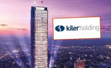 Türkiye’nin dikkat çeken yatırım grupları arasında yer alan Kiler Holding, gayrimenkul, enerji, perakende, ulaştırma ve sanayi alanlarında faaliyet gösteren güçlü bir holding yapısıyla öne çıkıyor. Temelleri 1980’li yıllarda atılan şirket, özellikle perakende sektöründeki büyümesiyle tanınırken ilerleyen yıllarda enerji ve gayrimenkul yatırımlarıyla faaliyet alanlarını genişletti. Bugün farklı sektörlerde faaliyet gösteren şirketleriyle dikkat çeken Kiler Holding, Türkiye ekonomisinin çok sektörlü yatırım grupları arasında yer alıyor. Konulu bir haber görseli.